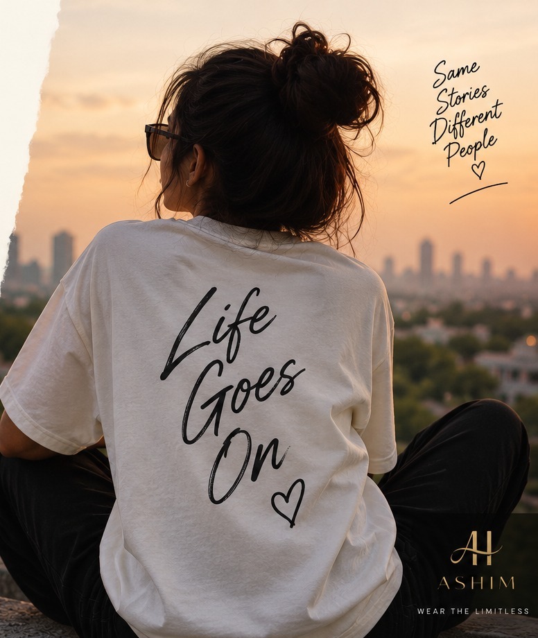 Woman wearing ASHIM Life Goes On T-shirt